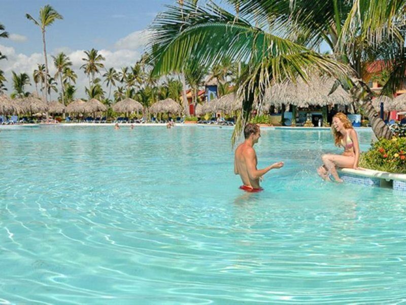 Punta Cana Princess Adults Only Hotel Exterior photo A swim-up bar at a resort in Punta Cana, Dominican Republic